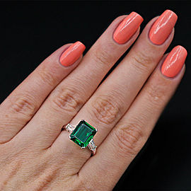 Platinum Cocktail Ring features with 6.00ct. Green Emerald and 0.50ct. Diamonds
