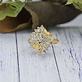 14k Yellow Gold Fashion ring features 0.80ct of graduated round Diamonds.