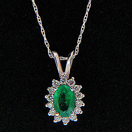Vintage .52ct Bright Green Oval Emerald 0.16ct Diamond 14k White Gold Pendant