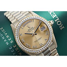 Rolex 36mm Presidential 18kt Gold Champagne Roma Dial Diamond Bezel Watch