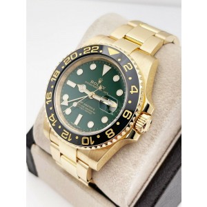Rolex gmt master ii green dial price 2025
