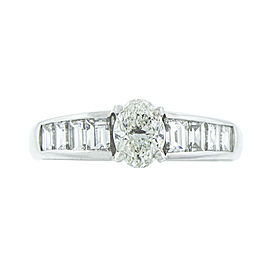 Platinum Oval and Emerald cut Diamond Ring