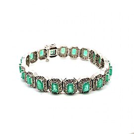 10.22ctw Emerald and 1.68ctw Round Diamond Bracelet 14K White Gold 7"